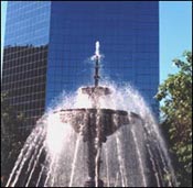 Picture of fountain and office building.